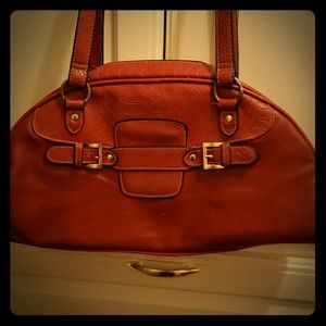 George Red leather handbag.